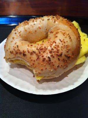 WARM GARLIC BAGEL WITH SCRAMBLED EGG