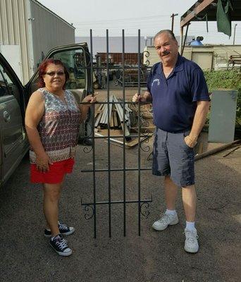 A client picking up a custom trellis at our shop.  Our sales manager Dave was helping her.