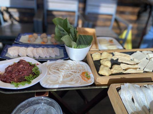 Tofu, garlic beef, udon noodles, taro, beef meatballs,