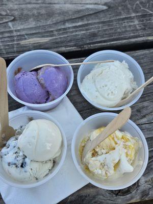 Top goes from Ube Caramel Coconut and Coconut Lime Sherbet .  Second row is Black Sesame Butter Crunch and Mango Cheesecake Swirl.