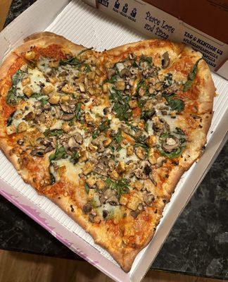 delicious heart shaped vegan magic mushroom pizza