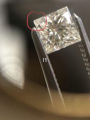 This princess cut diamond has a small inclusion on the corner making its clarity grade an I1.