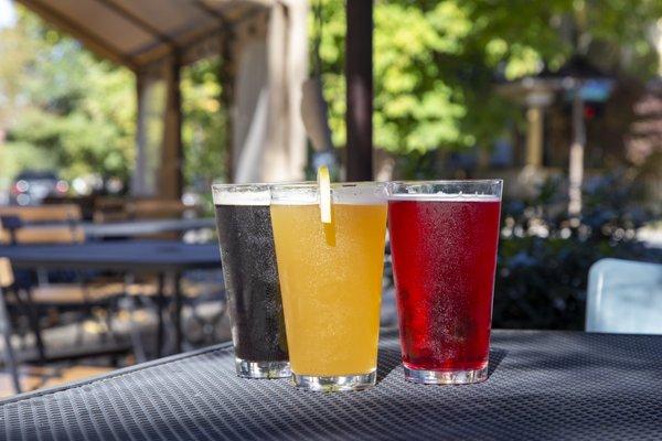 12 local beers, ciders and kombucha on tap. Outdoor seating in our covered courtyard or parking plaza.