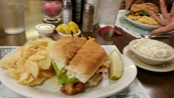 Ordered a fish sandwich....freshly battered cod, potato chips, pickle and Cole slaw included....