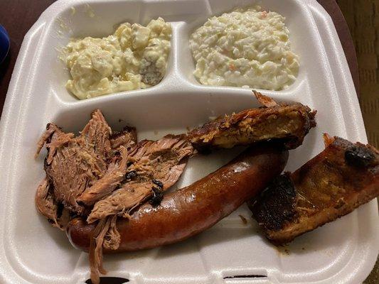 Meat Sampler ( 2 Pork Ribs, Brisket, Smoked Sausage, coleslaw and potato salad)!!!