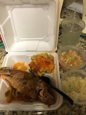 Steam fish dinner...with macaroni, Cole slaw, potato salad and switcher (lemonade).