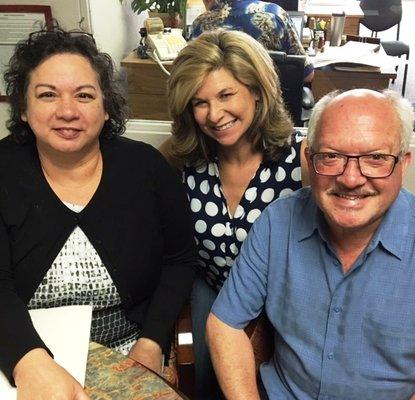 Casi & Carlos with their agent Kari- signing escrow papers for their new home. Exciting day.