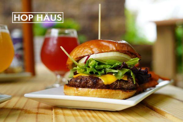 haus cheeseburger! certified angus with lettuce, tomato, onion, pickle & cheeses of course.