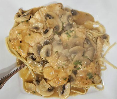 Chicken Marsala over linguini