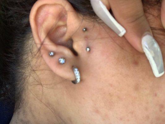 Surface tragus piercing.  ( you can see the scarring from my original piercer)