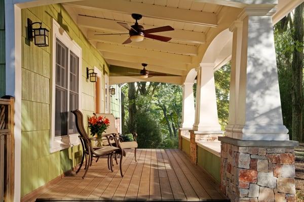 Vienna, VA; conversion of unattractive sunroom into bungalow style front porch; stone pedestals; square tapered columns