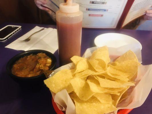 Chips, Salsa & Hotter Salsa in bottle