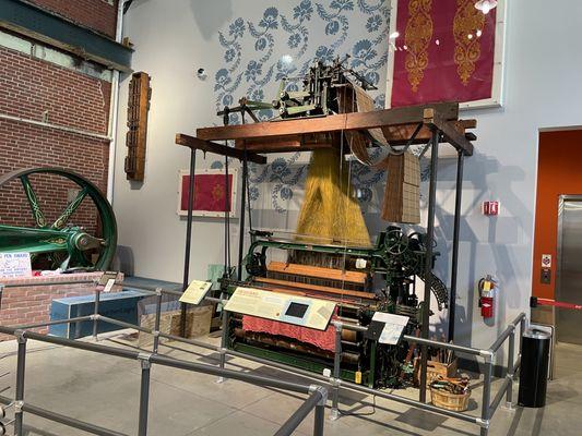 Loom and the progress toward production of cloth...