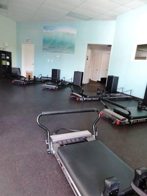 One Body Studios state of the arts yoga and Pilates facility is suitable for rehab and available to Dr. Palladino's patients.