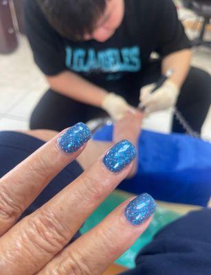 Blue this time around. Gel manicure by Mary and Pedicure by Tony.