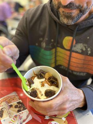 The caramel apple pie with graham cracker, brownie pieces, caramel and marshmallow topping