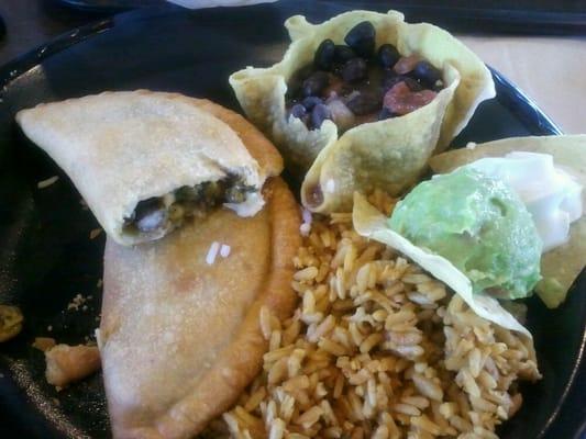 Empanada platter blak beans and mexican rice