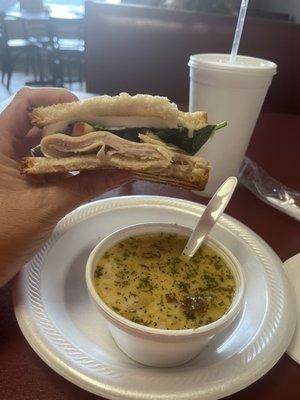 1/2 turkey, brie, peaches, spinach & honey sandwich with cup of cauliflower chowder