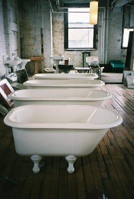 Bathtub refinishing gave these old clawfoot tubs a new lease on life.