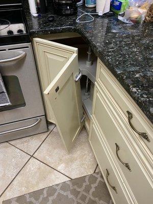 Broken cabinet door.