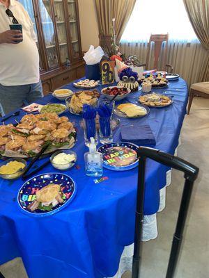 Tony's croissant party tray, delicious guacamole and their own brand tortilla chips, fruit, cheeses, salami and sweet raspberry cookies!