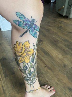 dragonfly tattoo! daffodil and olive branch on my calf