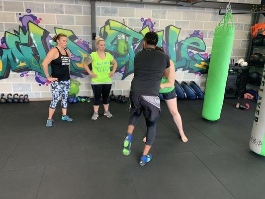 WildStyle Warrior women learning clinch knees!