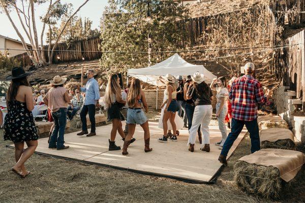 Guests boot scootin ..