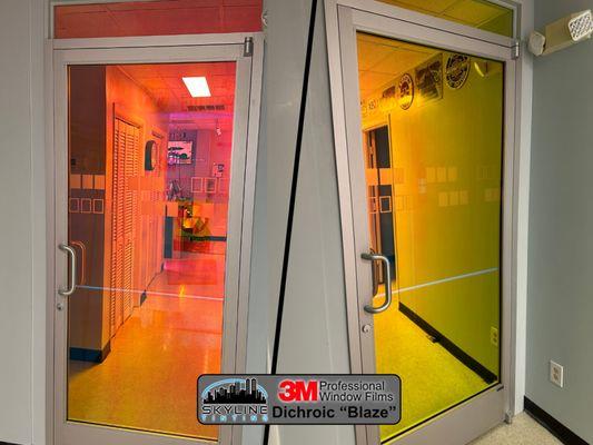 3M's colorful Dichroic film installed on an office door in Chesapeake.