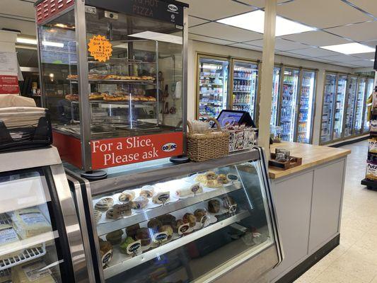 Our pizza spinner with our fresh-baked muffins and pastries!