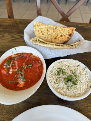 Chicken Tikka Masala (tomato flavor - not spicy for a baby) and a coconut naan (with dried fruits and nuts)