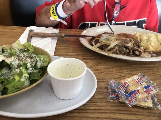 Chopped steak gravy mashed potatoes and salad with homemade ranch.