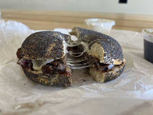 Fancy French Dip Sandwich with a poppy bagel