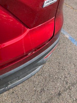 Dripping dirty streaks on rear bumper