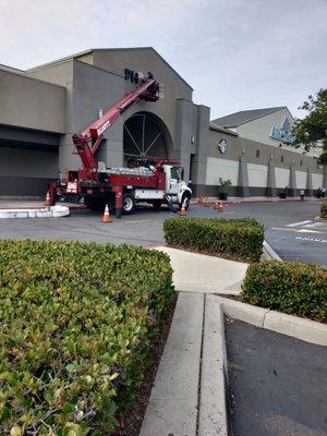 Taking old sign down