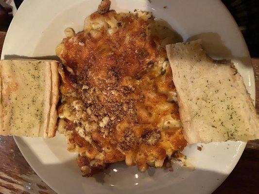 BAKED MAC AND CHEESE large corkscrew pasta tossed in a four cheese cream sauce and baked with garlic bread crumbs