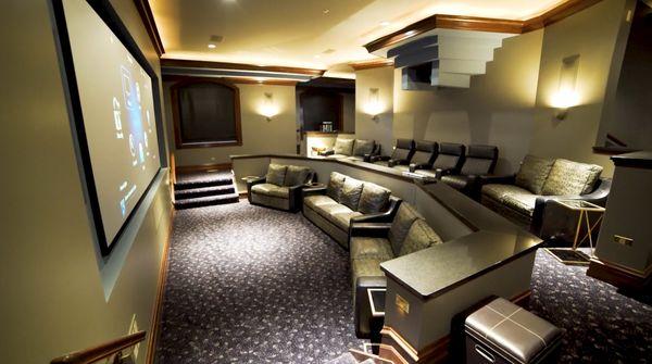 HOME THEATER MASTERPIECE This Northern Audio custom-designed home theater includes a 7.2.4 surround system & 181-inch screen.