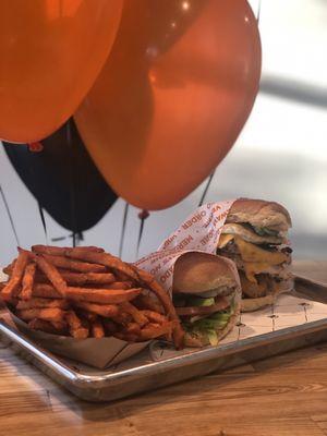 In order: Sweet potato French fries, turkey burger California style, and a chicken burger cowboy style.