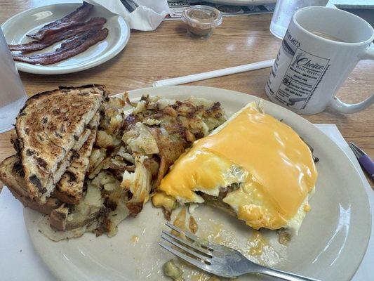 Veggie omelette with potatoes and raisin toast!