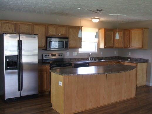 One of our custom kitchens in our single family homes.