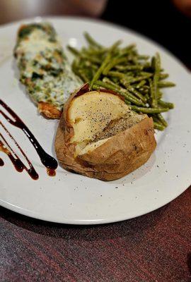 Salmon Rockefeller with green beans and baked potato