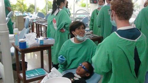 Dr. Edalatpour working on her mission trip for Children's Dental Care in Stoneham, MA