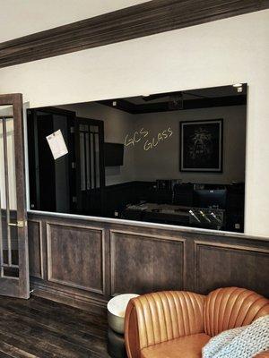 Black backpainted glass whiteboard installed in a home office in Lower Highlands, Colorado.