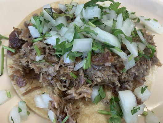 Close-up of "Big Carnitas" soft taco