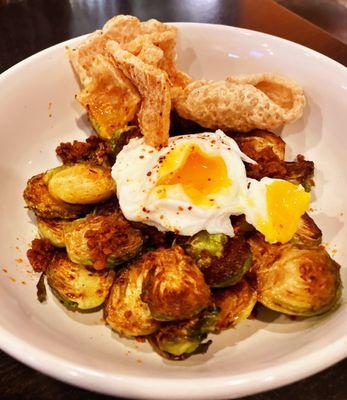 Roasted Brussels Sprouts with chorizo, chicharrones & poached egg after we broke the yolk. Delish & the sprouts were roasted perfectly.