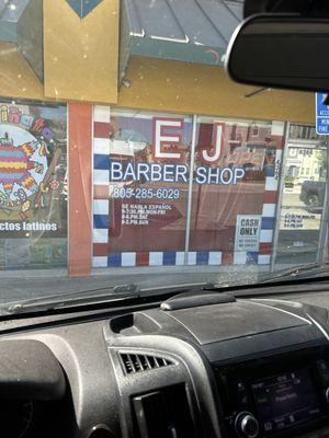 Front of barber shop.