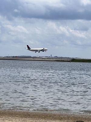 Great place to relax and plenty of free parking in the parking lot that wraps around the horseshoe shape beach.