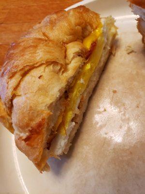 Half bacon egg and cheese crossiant