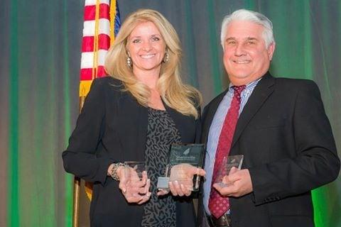 Mark and Charlene earn awards from Sharonville Chamber of Commerce.