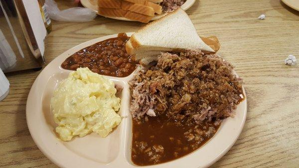 Chopped pork dinner with two sides